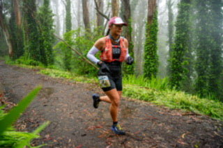 Alex running in an ultra race. 